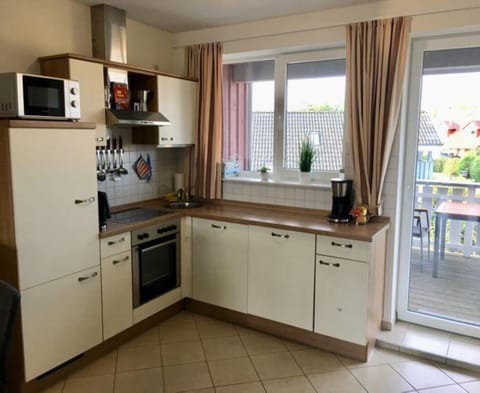 Apartment | Private kitchen | Electric kettle, toaster, highchair