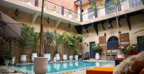 Outdoor pool, pool umbrellas, sun loungers