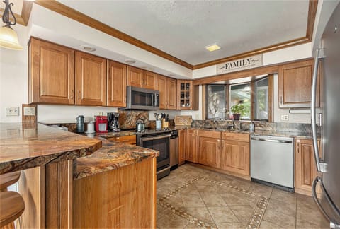 The main kitchen (upstairs) is the perfect spot to whip up a delicious meal.