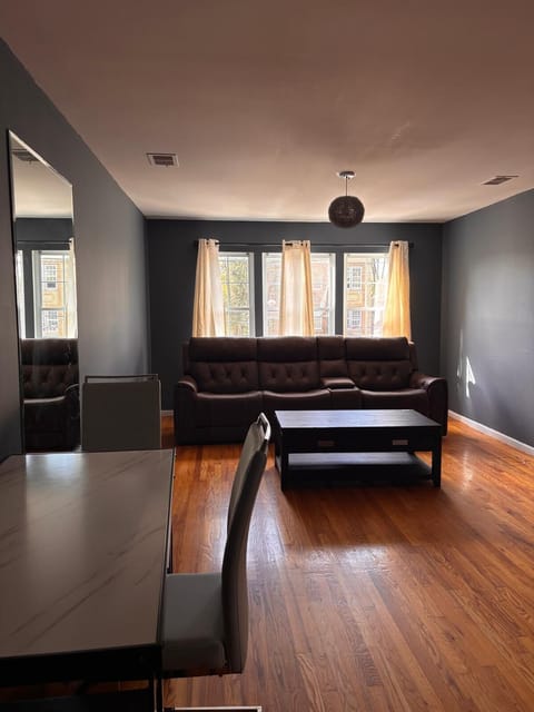 Basic Single Room, 1 Bedroom | Living area | Flat-screen TV