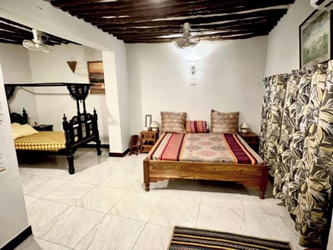 Standard Triple Room | Laptop workspace, blackout drapes, soundproofing, iron/ironing board