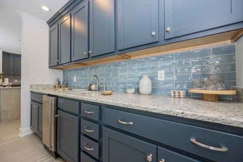 Grab a chilled drink from the fridge or create your favorite cocktail at the wet bar