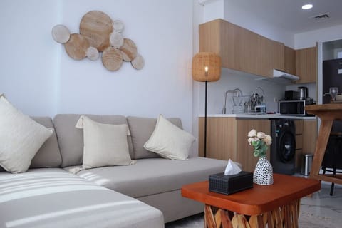 Welcome to a living room where comfort meets style, perfect for cozy gatherings