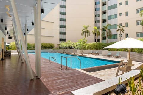 Dive into luxury with a sparkling outdoor pool, perfect for relaxation and fun.
