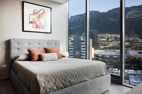 Bedroom 1 offers mountain views and a relaxing atmosphere.