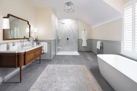 Dunluce Suite | Bathroom | Hair dryer, bathrobes, slippers, heated floors