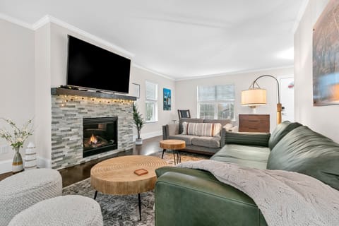Living room with Fire place and TV