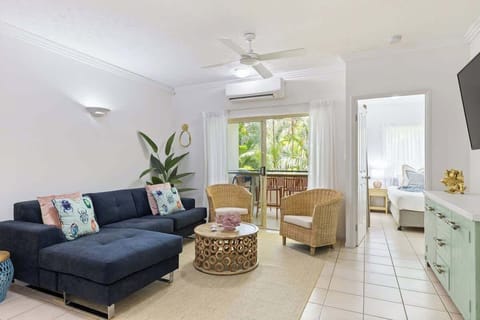 The living area offers a spacious open-plan layout, providing a comfortable and inviting space for relaxation.
