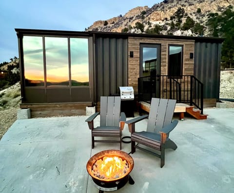 Wake up surrounded by Southern Utah views in a glass-ceiling cabin at East Zion Resort near Zion National Park and Bryce Canyon.