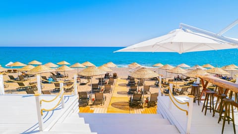 Private beach nearby, free beach shuttle, sun loungers, beach umbrellas