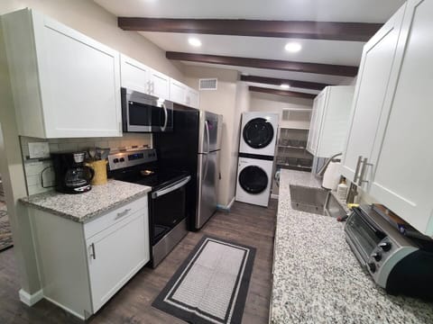 Our fully-stocked kitchen has everything you'll need, including a new LG washer and gas dryer.