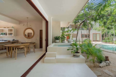 Private pool setting with natural surroundings, perfect for unwinding.