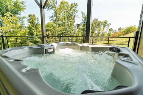 Your Hot Tub Retreat you'll never forget. Soak in tranquility with stunning views and bubbling relaxation!