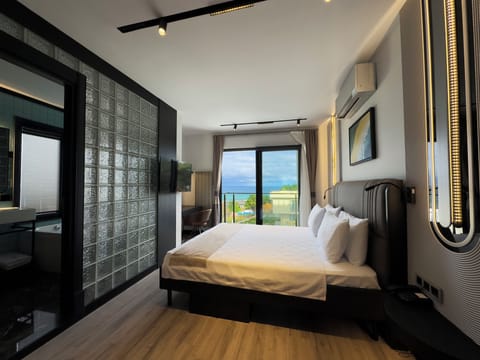 Deluxe Room, Balcony, Sea View | Beach/ocean view