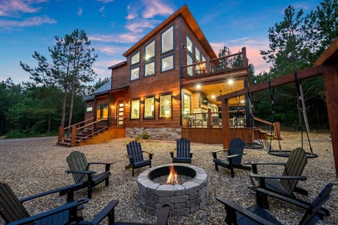 Flickering flames illuminate the faces of friends sharing stories under a starlit sky.