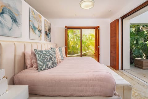Master Bedroom Suite featuring a luxurious King bed, a private en-suite bathroom