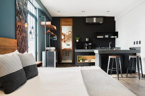 Deluxe Studio, Balcony, City View | Premium bedding, pillowtop beds, in-room safe, individually decorated