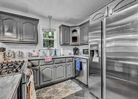 Nice large fridge, microwave and everything to cook your families meals.