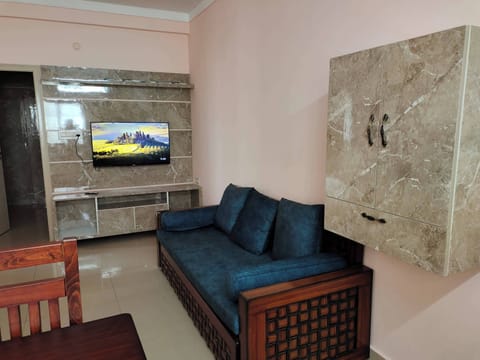 Living room with sofa bed and dining table