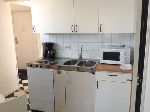 Apartment, 2 Bedrooms | Private kitchenette | Fridge, microwave, stovetop, coffee/tea maker