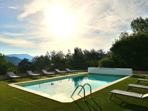 Outdoor pool, open 8:00 AM to 8:00 PM, pool umbrellas, sun loungers