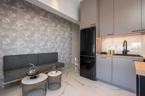 Deluxe Apartment, 2 Bedrooms, Beachside | Living area | Flat-screen TV