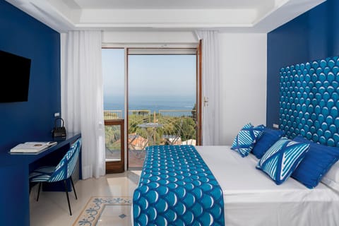 Panoramic Double Room, Balcony, Sea View | Minibar, in-room safe, desk, laptop workspace