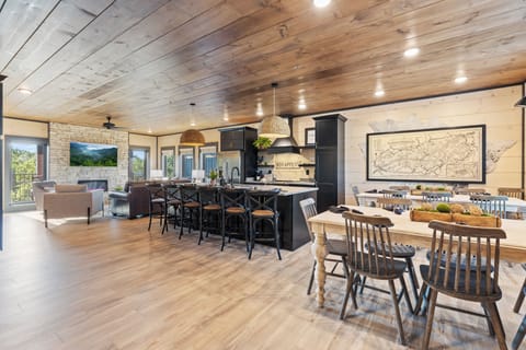 Dine together with loved ones around the large table, boasting ample seating