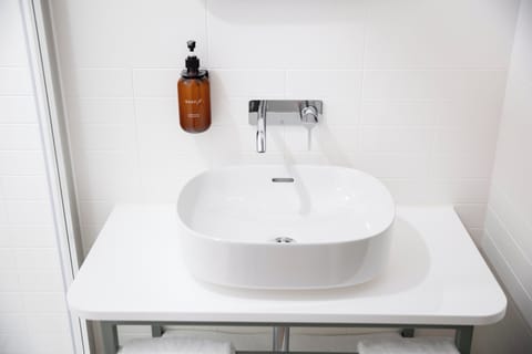 Shower, eco-friendly toiletries, hair dryer, towels