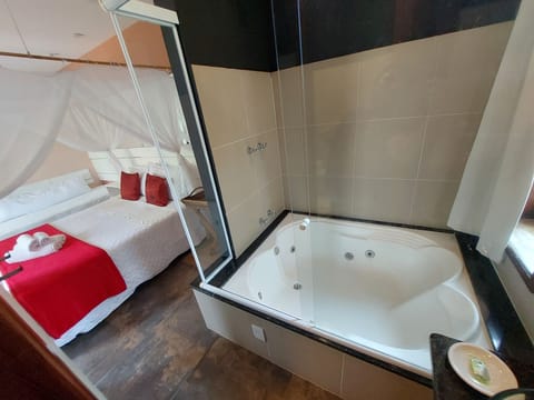 Romantic Suite, 1 Queen Bed, Non Smoking, Air conditioning | Free WiFi, bed sheets