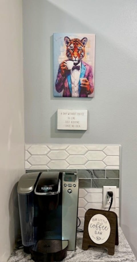 Keurig coffee bar includes pods, sugars & cream.