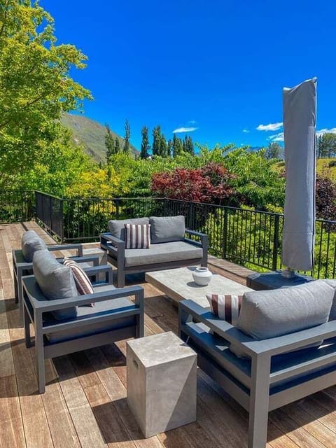 Sun-drenched deck with space to gather and unwind