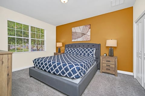 Recharge in comfort in this inviting king bedroom, complete with a plush king bed, flat-screen TV, high-speed Wi-Fi, and a relaxing atmosphere perfect for unwinding after a fun-filled day.