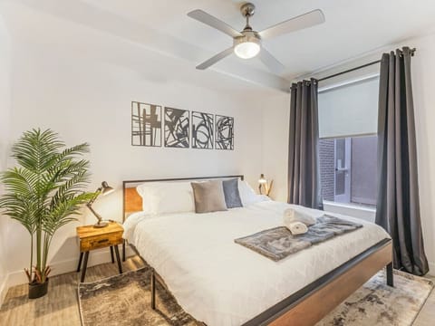 Bright and cozy bedroom with a king bed, soft linens, and relaxing décor for a restful stay 🛏️✨