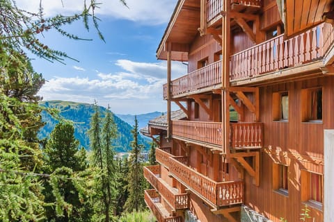 Nestled in the mountains, this charming retreat offers breathtaking forest views from private balconies, immersing you in serene nature.