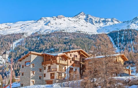 Set against a stunning mountainous backdrop, this inviting retreat provides easy access to the slopes, combining adventure with the tranquility of alpine living.