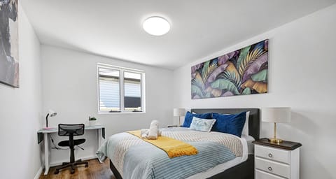 Bedroom with workspace area.