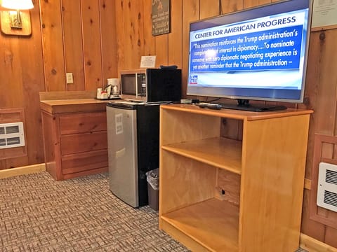 Superior Quadruple Room, Multiple Beds | Living area | Flat-screen TV