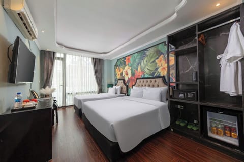 Luxury Triple Room, City View | In-room safe, desk, blackout drapes, soundproofing
