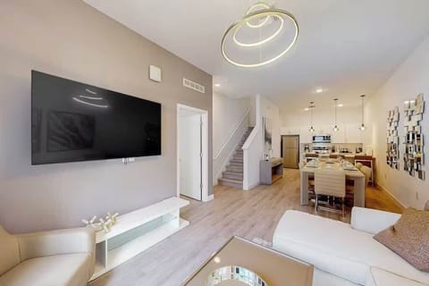 Cozy living space with a smart TV, perfect for movie nights or relaxation after a day of adventure.