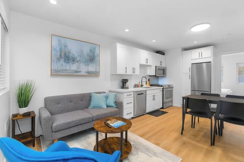 Comfort Apartment | Living area | 40-inch flat-screen TV with digital channels