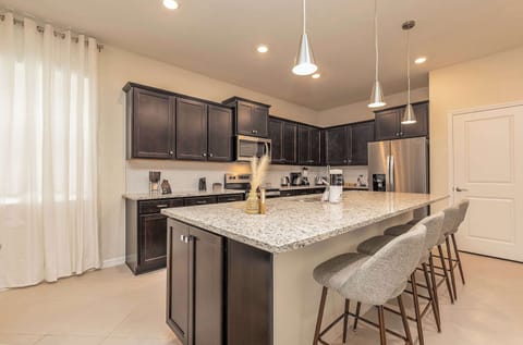 Use the breakfast bar for meals or as a work-friendly spot.