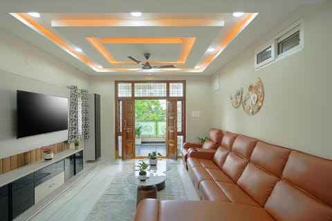 Premium Apartment, 3 Bedrooms | Living area | 40-inch LED TV with digital channels