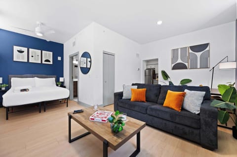 Living Room: An open-plan design with plenty of natural light and contemporary decor, making you feel right at home.