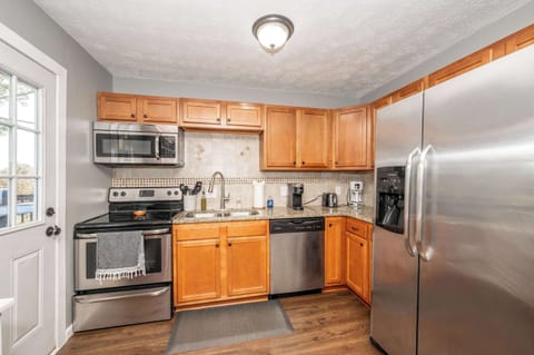 The open kitchen is spacious & offers all the comforts of home