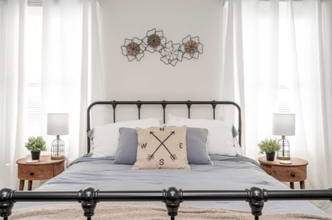 Apartment B’s bedroom sanctuary includes a comfy queen-sized bed