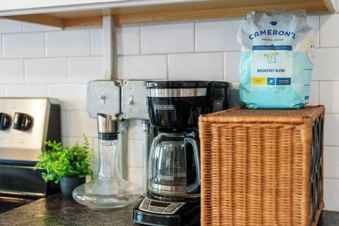 The open, airy kitchen offers ample space & every home comfort