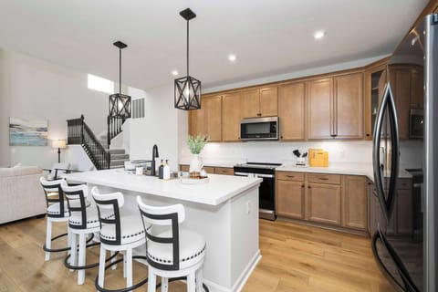 Crafting meals and memories on the chic white countertops