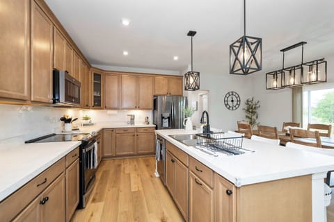 Crafting meals and memories on the chic white countertops