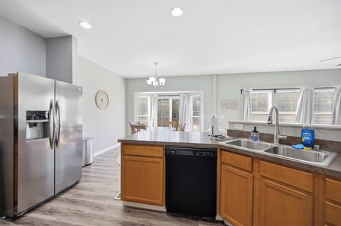 The open, airy kitchen offers ample space & every home comfort